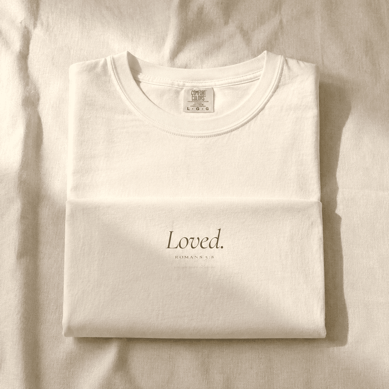 Close detail of tonal Loved tee print